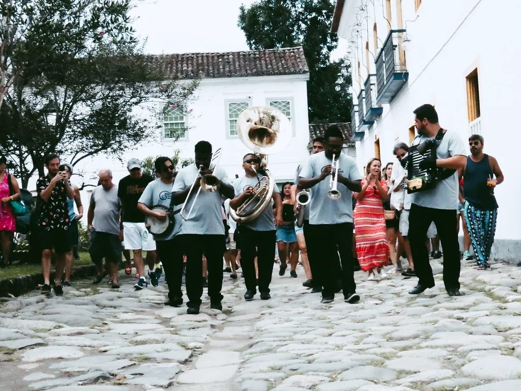 Live music fills Paraty's colonial squares during the Bourbon Festival.